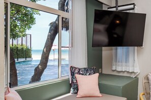 Room (Pool Side Partial Sea View) | Living area | 50-inch LCD TV with cable channels, TV - Davinia Resort Hua Hin (Hua Hin)
