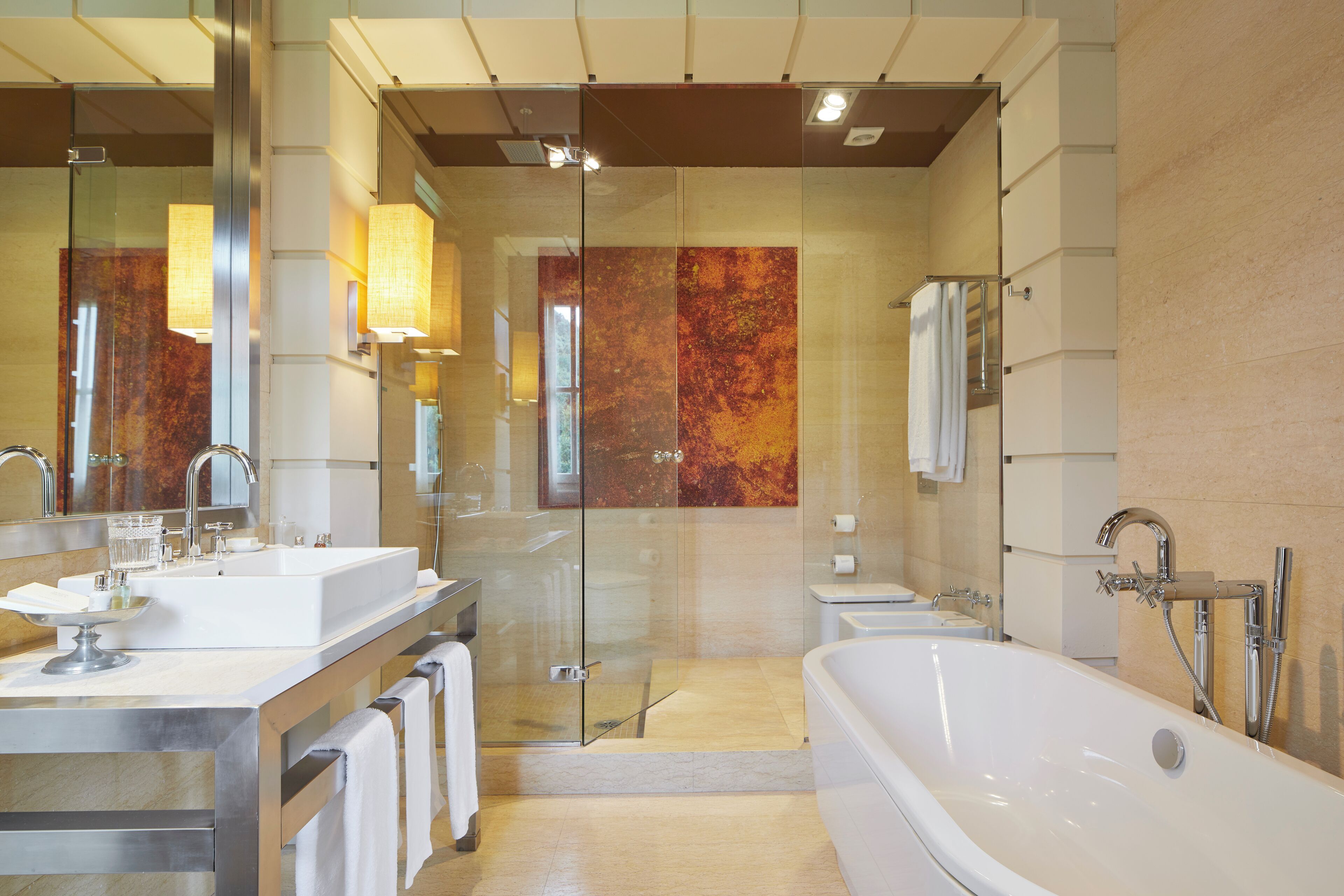 deluxe double room, 1 king bed, balcony, sea view | bathroom | separate bathtub and shower, free toiletries, hair dryer, dressing gowns