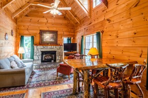 Three Bedroom Cabin The Cherokee or The Stuart | Living area | Flat-screen TV