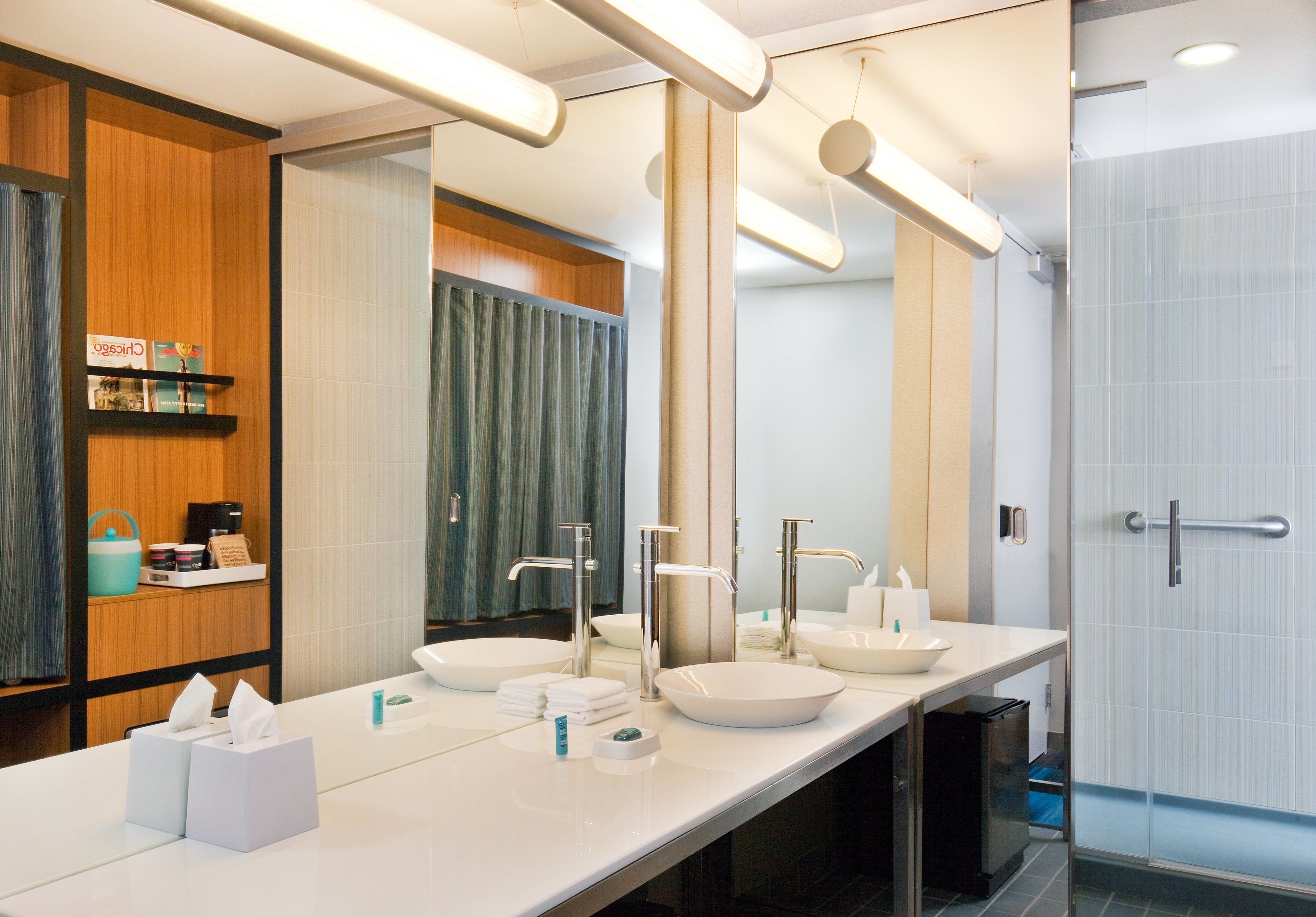 shower, designer toiletries, hair dryer, towels