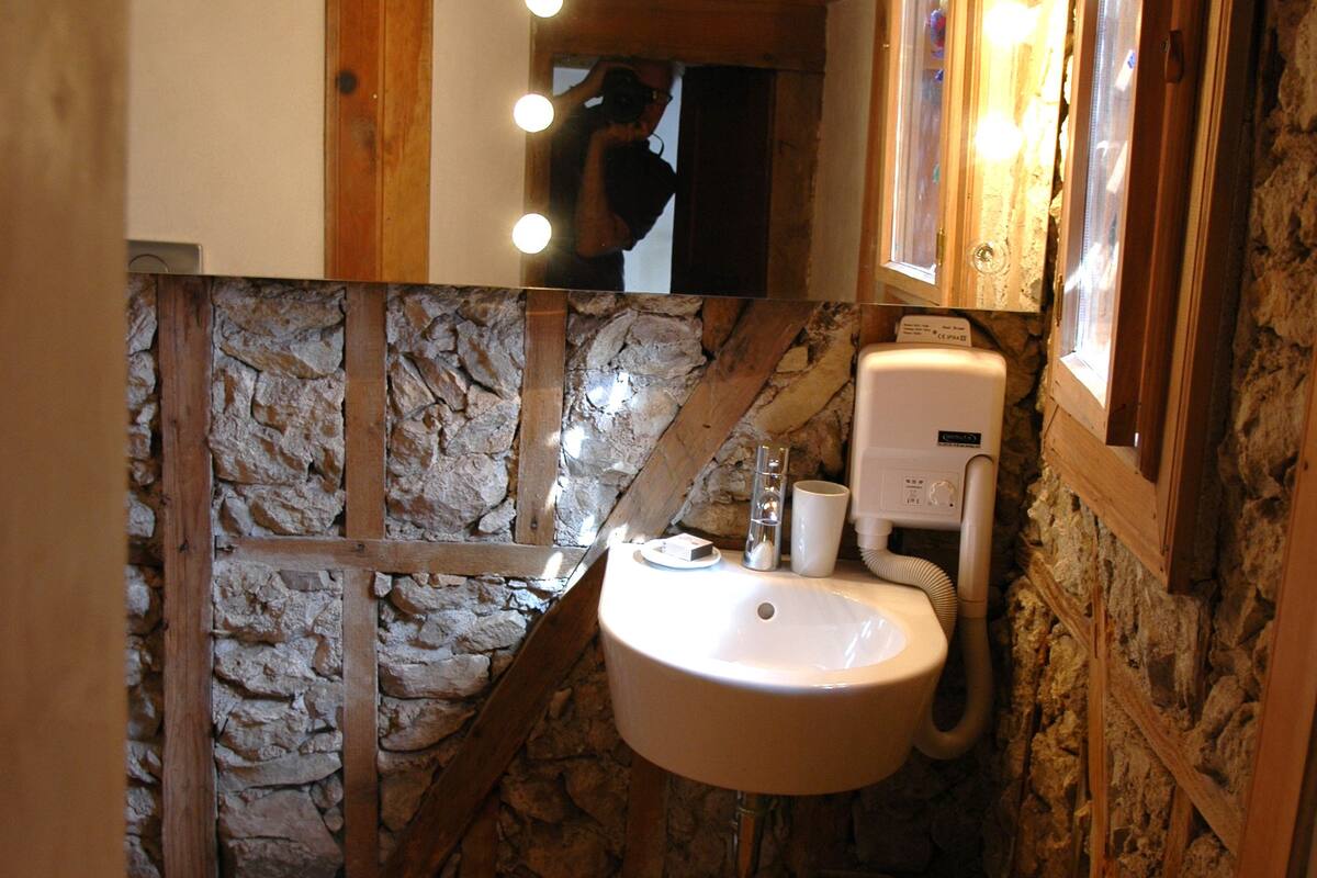 superior double or twin room | bathroom | deep-soaking bathtub, rainfall showerhead, free toiletries, hair dryer