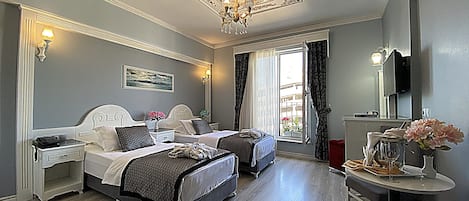 Frette Italian sheets, premium bedding, down comforters, minibar