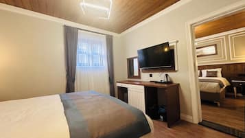 2 habitaciones, ropa de cama de alta calidad y minibar