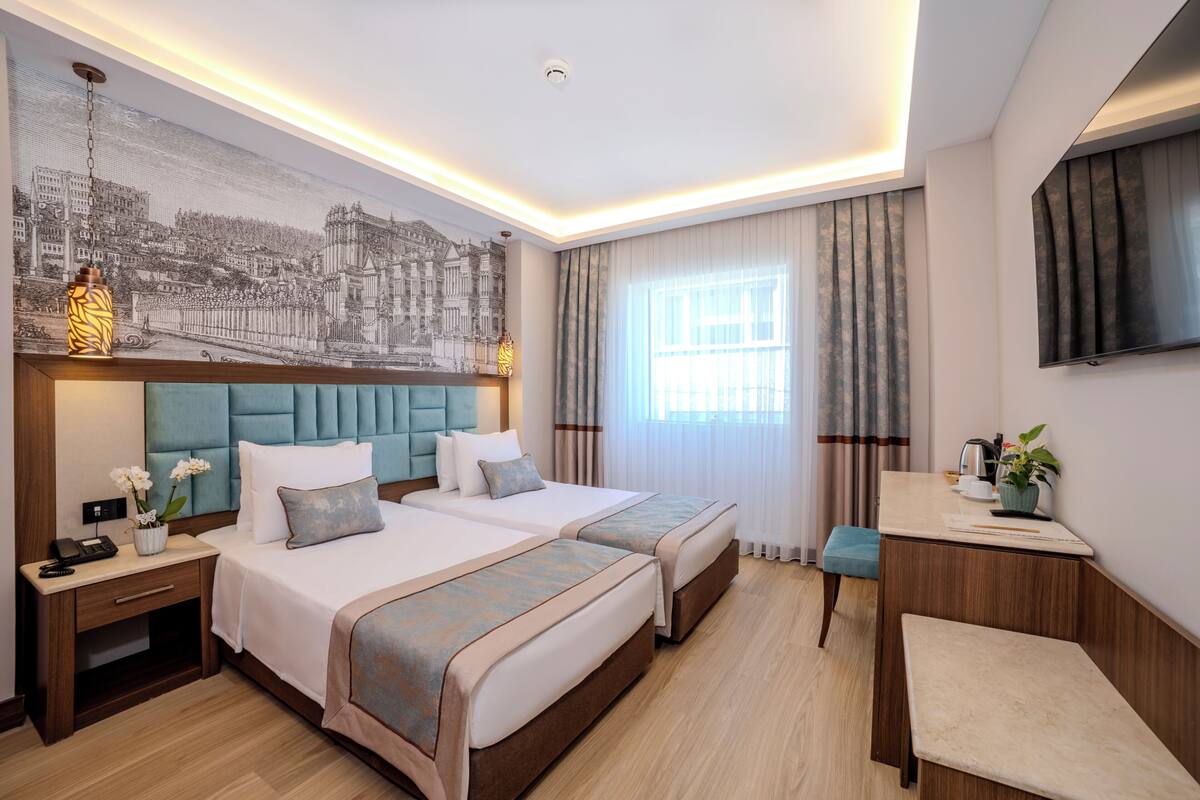 Bộ đồ giường kháng dị ứng, minibar, két bảo mật tại phòng, bàn 