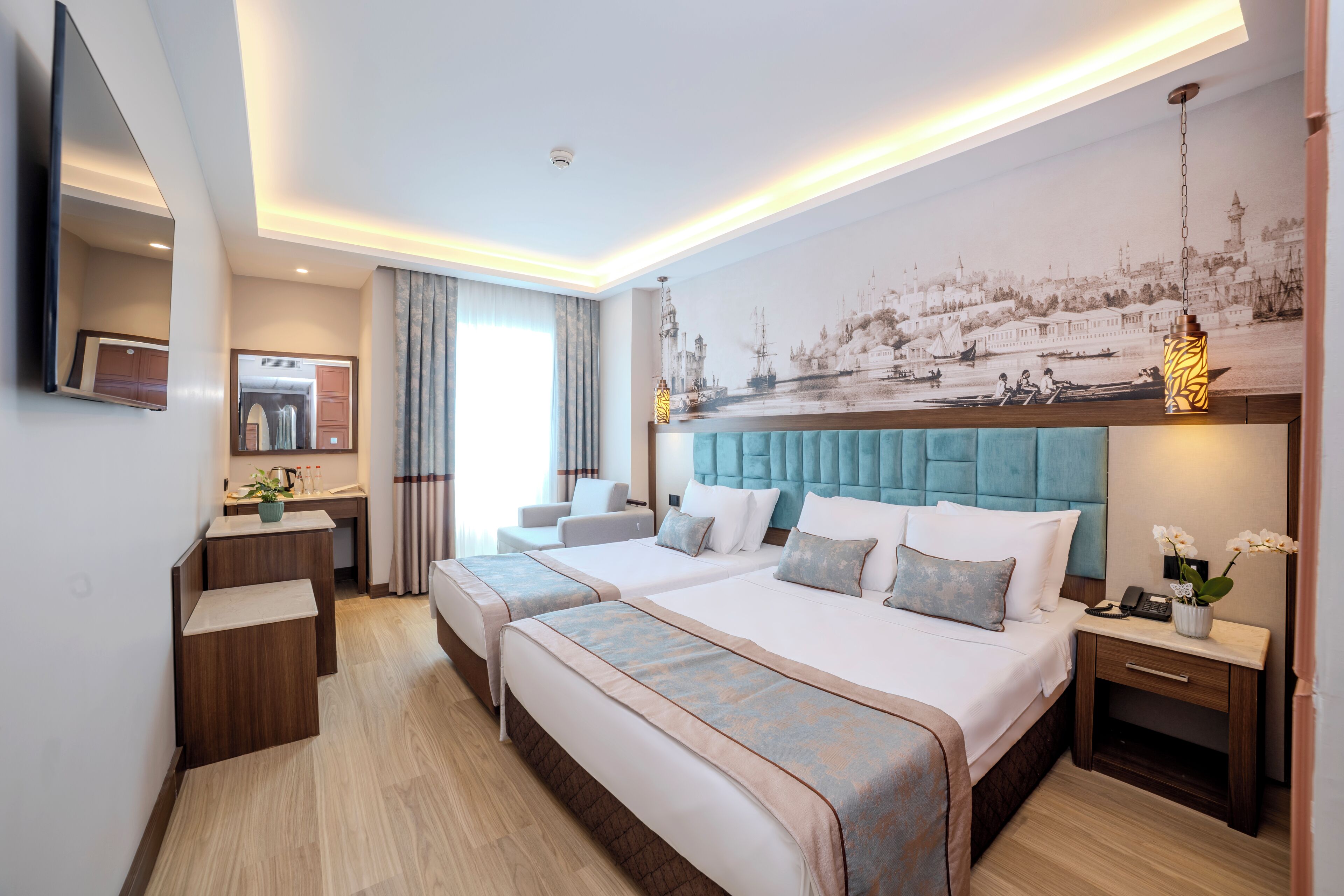 Triple Room | Minibar, in-room safe, desk, soundproofing