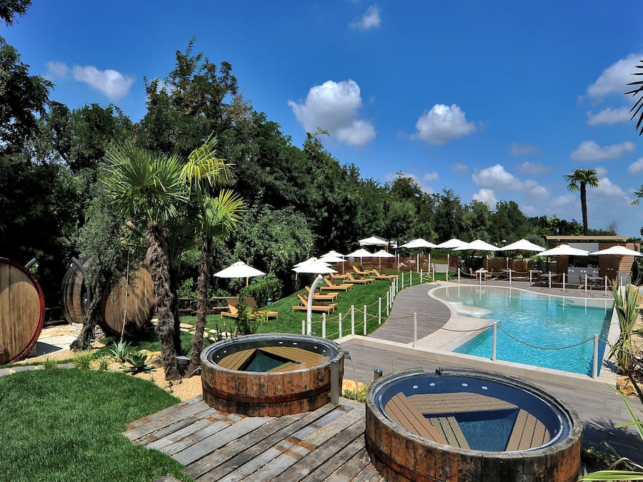 Seasonal outdoor pool, open 9:30 AM to 7:30 PM, pool umbrellas