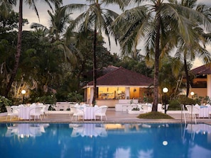 Outdoor pool, open 7 AM to 7 PM, pool umbrellas, sun loungers - Novotel Goa Dona Sylvia Resort (Cavelossim)
