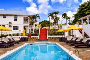 Outdoor pool, pool umbrellas, sun loungers