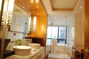 Combined shower/tub, free toiletries, hair dryer, bathrobes