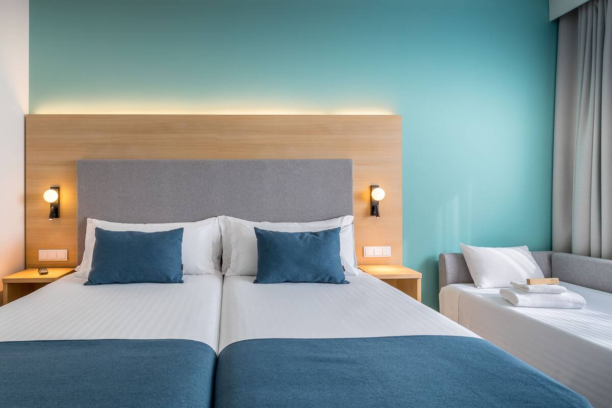 standard triple room | premium bedding, in-room safe, individually furnished, desk