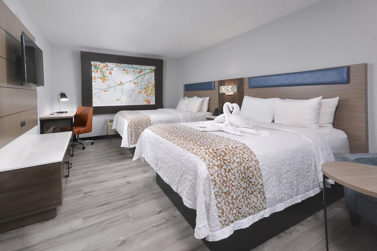 Standard Room, 2 Queen Beds, Non Smoking | Down comforters, Tempur-Pedic beds, individually decorated