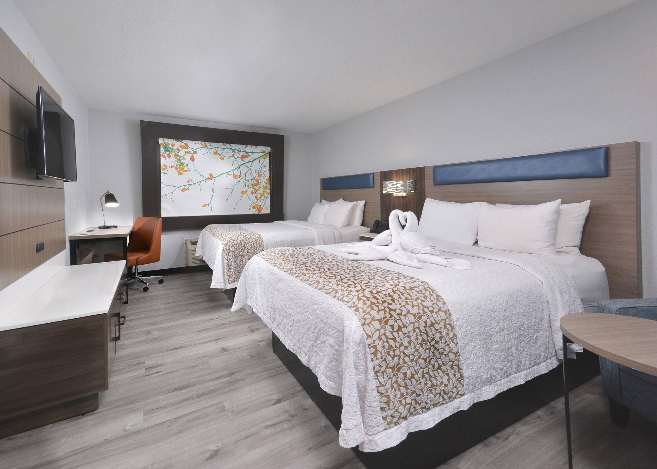 Standard Room, 2 Queen Beds, Non Smoking | Down comforters, Tempur-Pedic beds, individually decorated