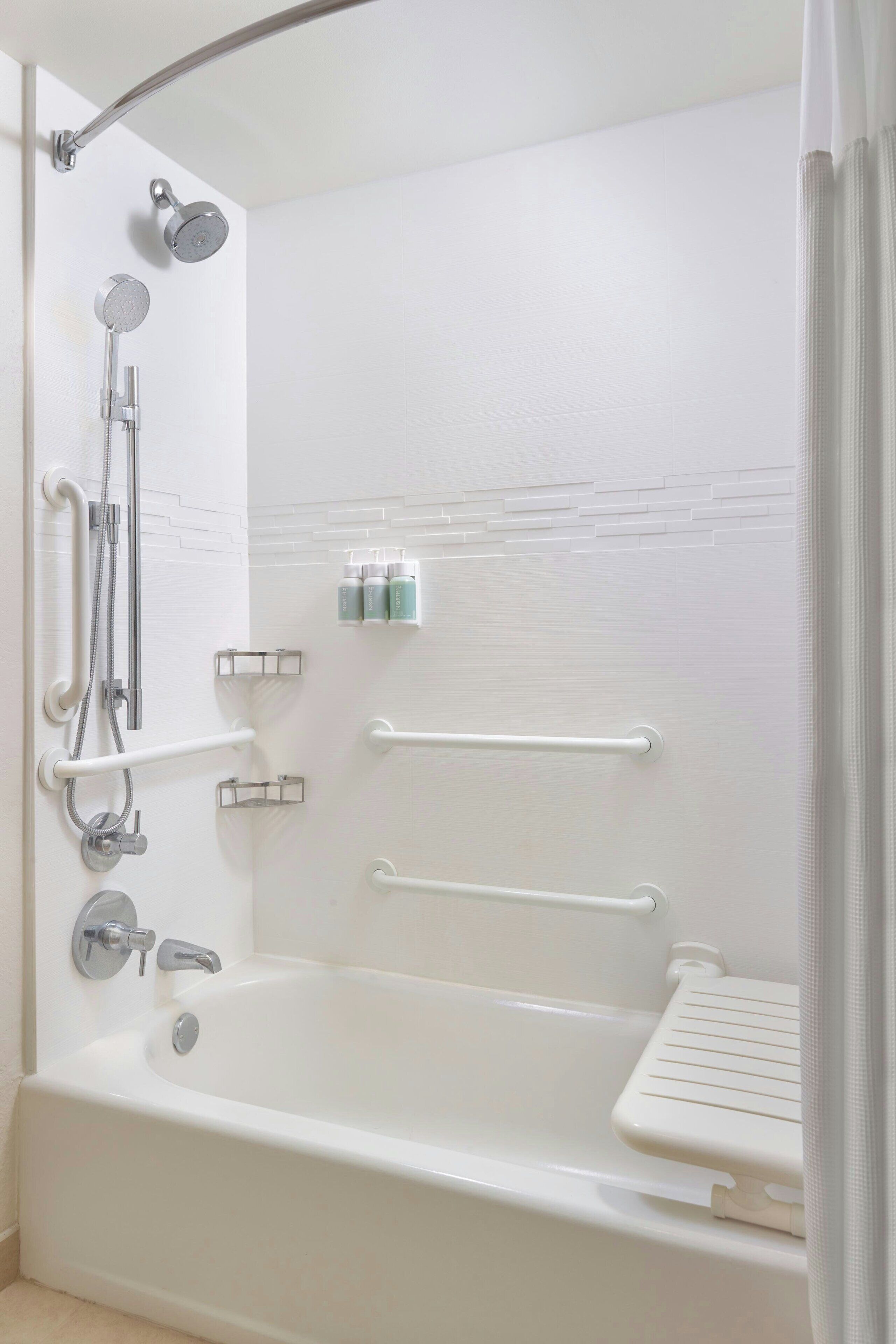 combined shower/bathtub, free toiletries, hair dryer, towels