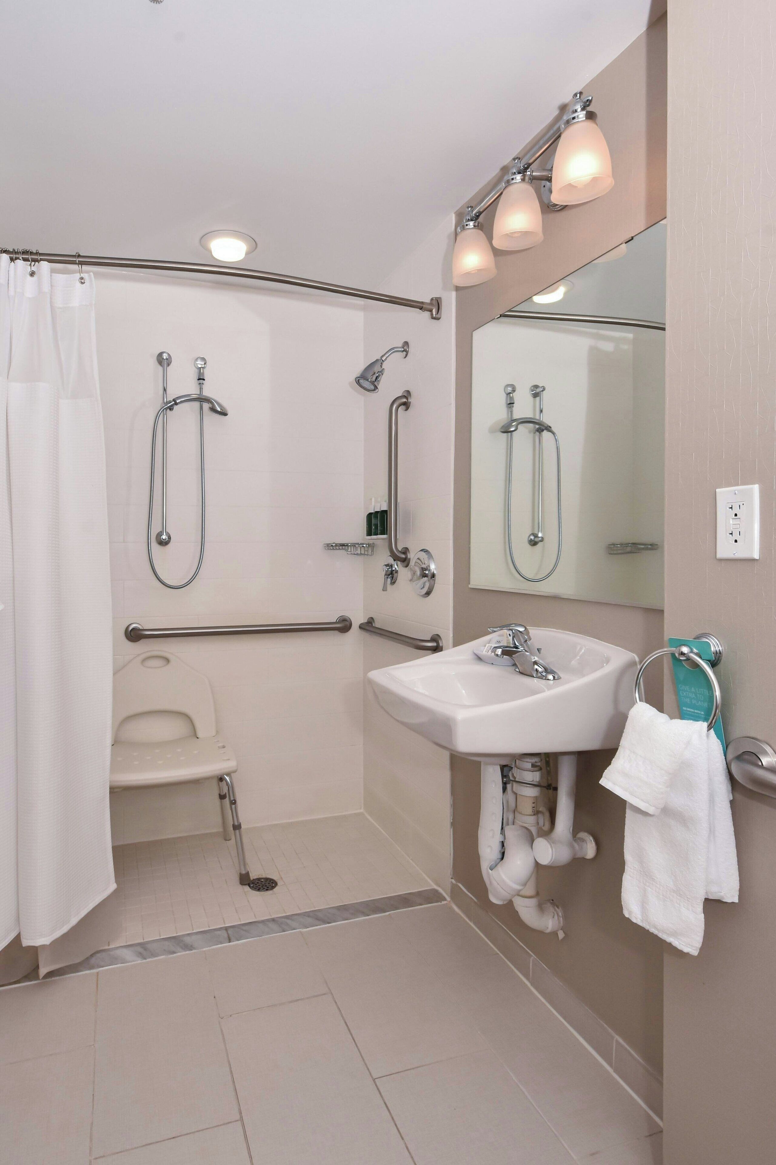 combined shower/bathtub, free toiletries, hair dryer, towels