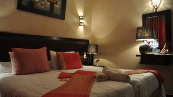 SÀngtillbehör av högsta kvalitet och minibar