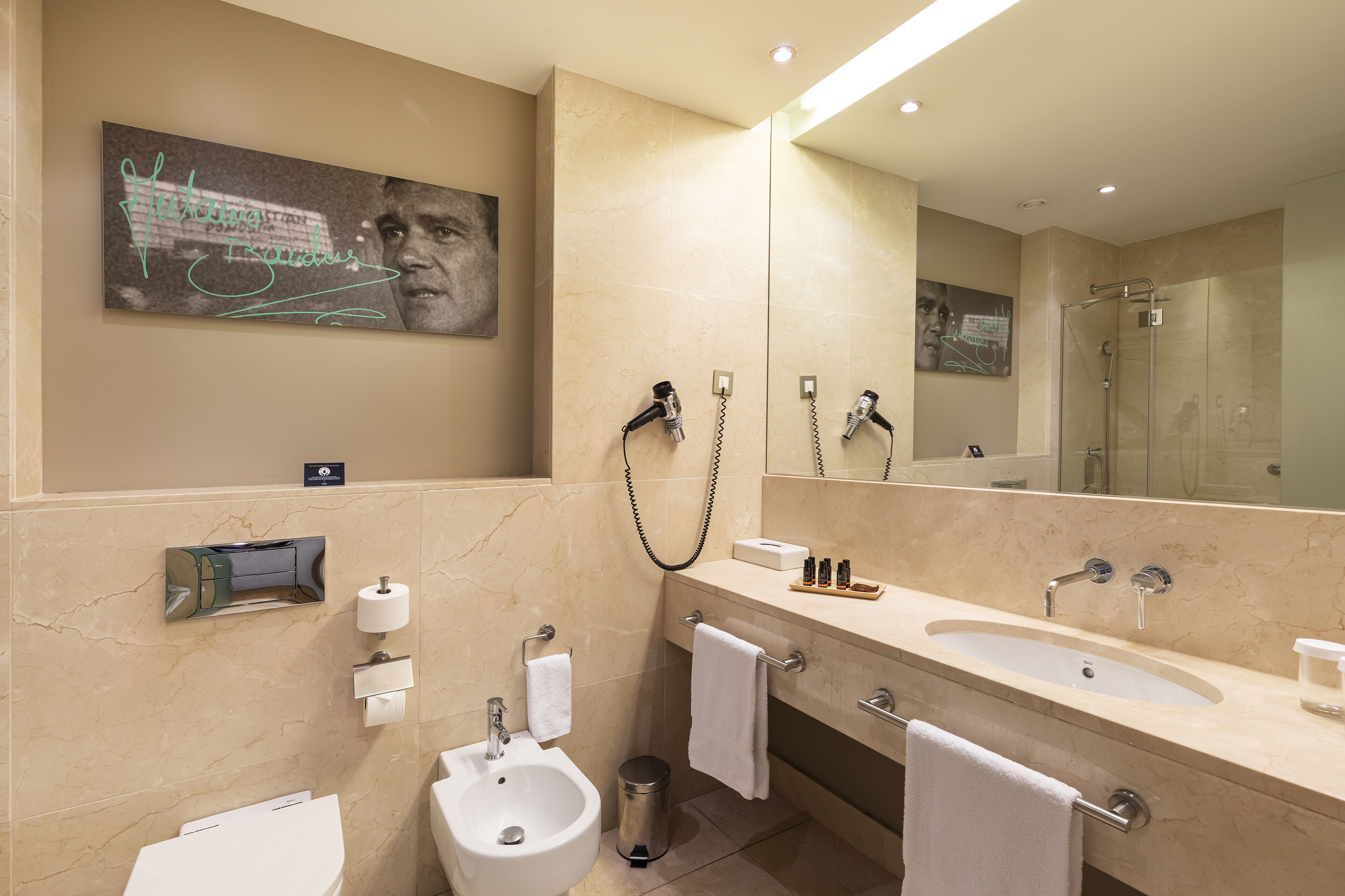 family room | bathroom | hair dryer, bidet, towels