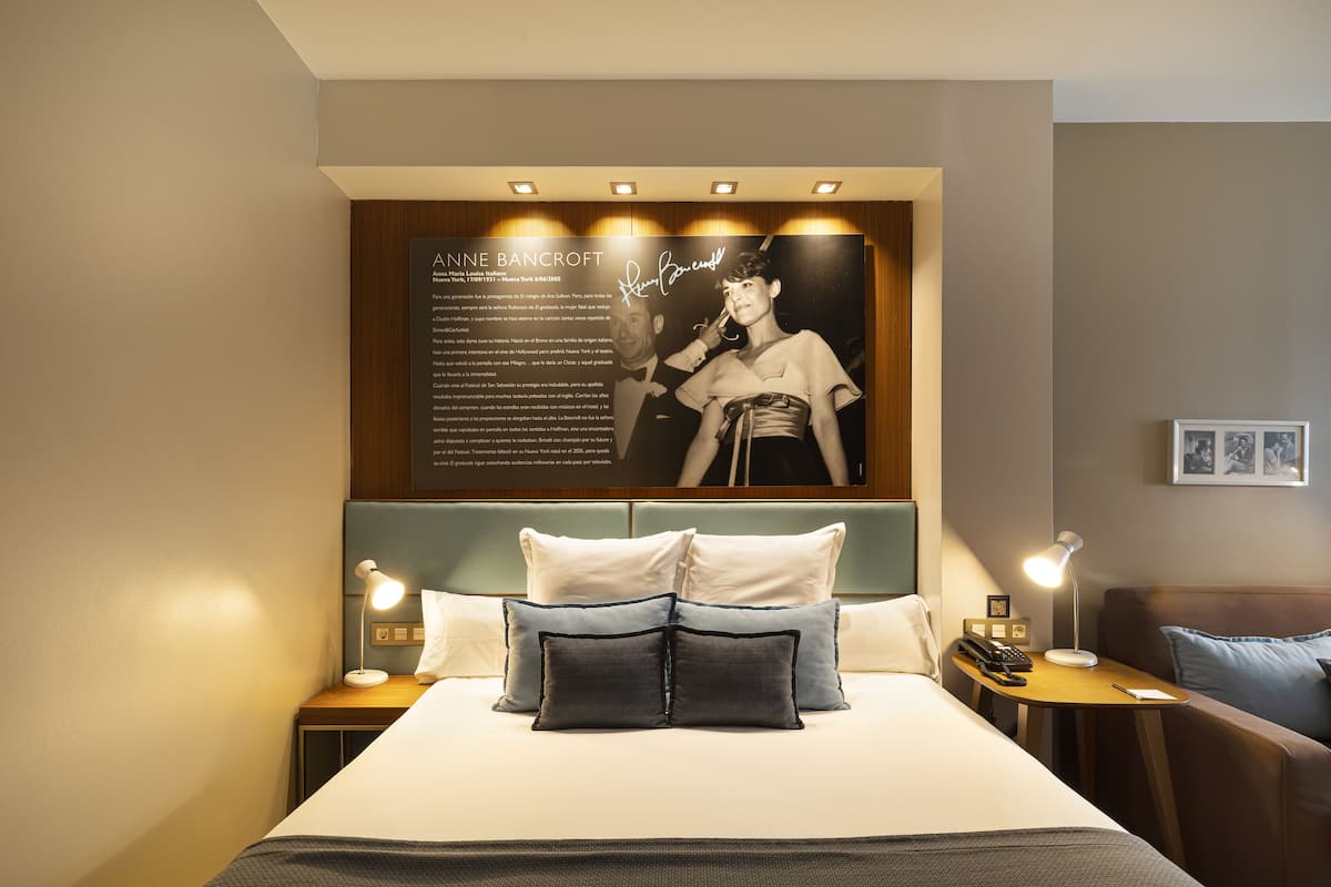 family room | free minibar items, in-room safe, individually decorated, desk