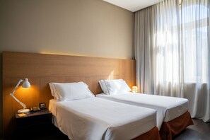 Luxe beddengoed, donsdekens, een minibar, een kluis op de kamer