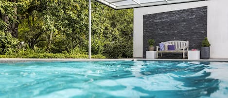 Seasonal outdoor pool, pool umbrellas, pool loungers