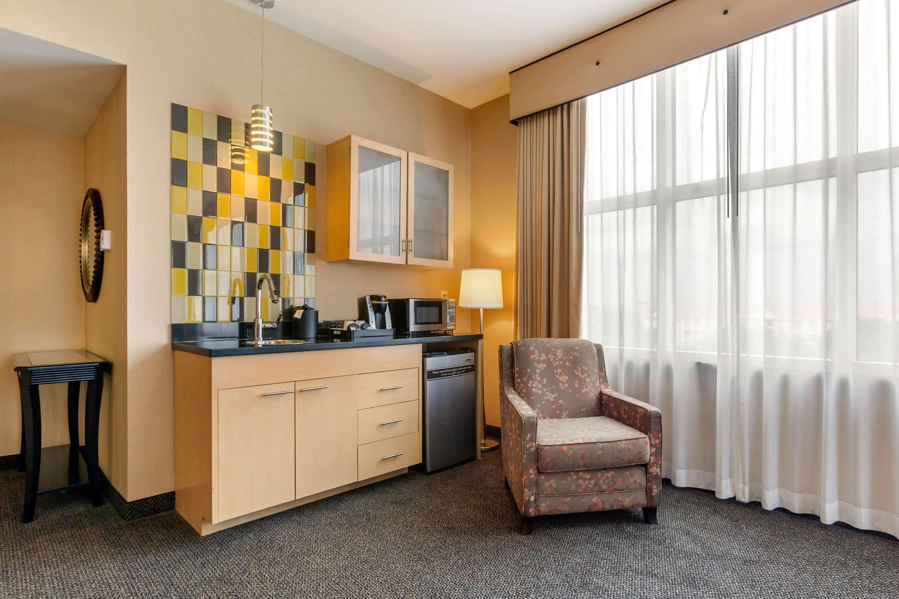 premium bedding, desk, blackout curtains, iron/ironing board