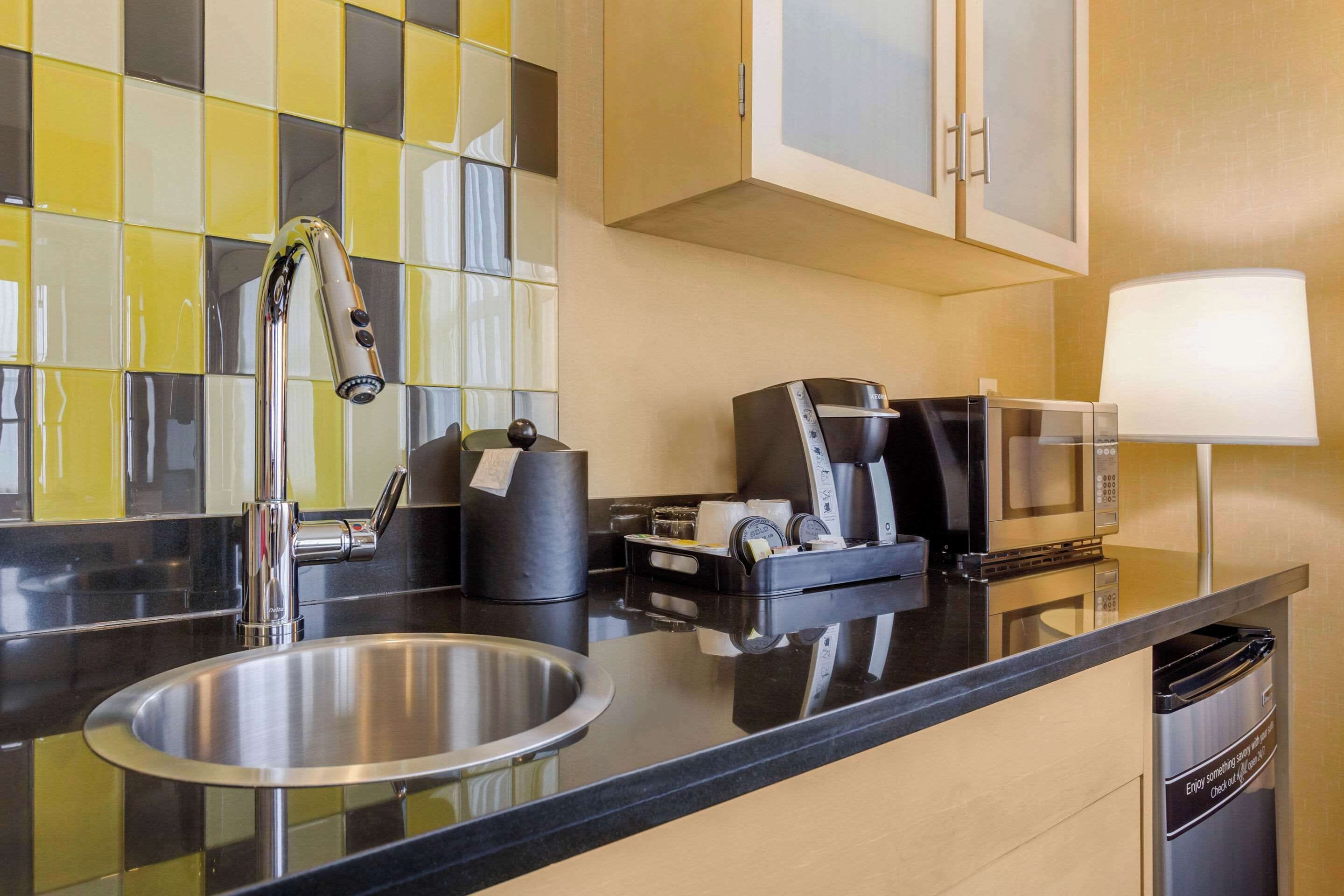 premium bedding, desk, blackout curtains, iron/ironing board