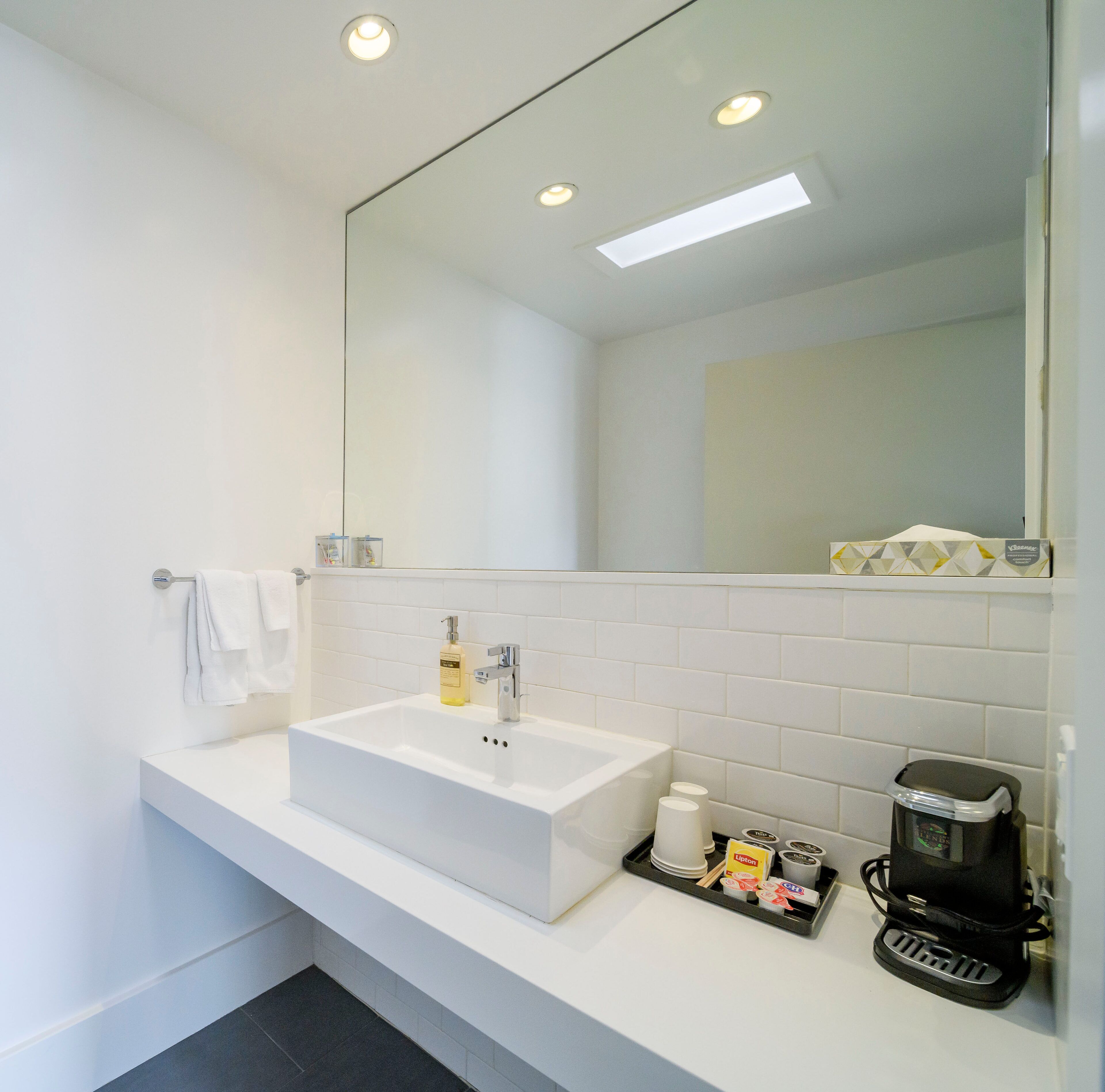 rainfall showerhead, free toiletries, hair dryer, towels