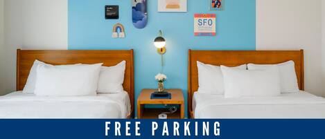 Habitación superior, 2 camas Queen size | Caja de seguridad en la habitación, escritorio y cortinas blackout