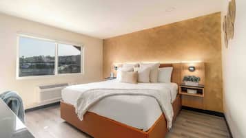 Room, 1 King Bed | In-room safe, individually decorated, individually furnished, desk