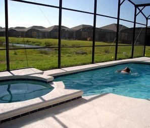 Outdoor pool, pool umbrellas, sun loungers