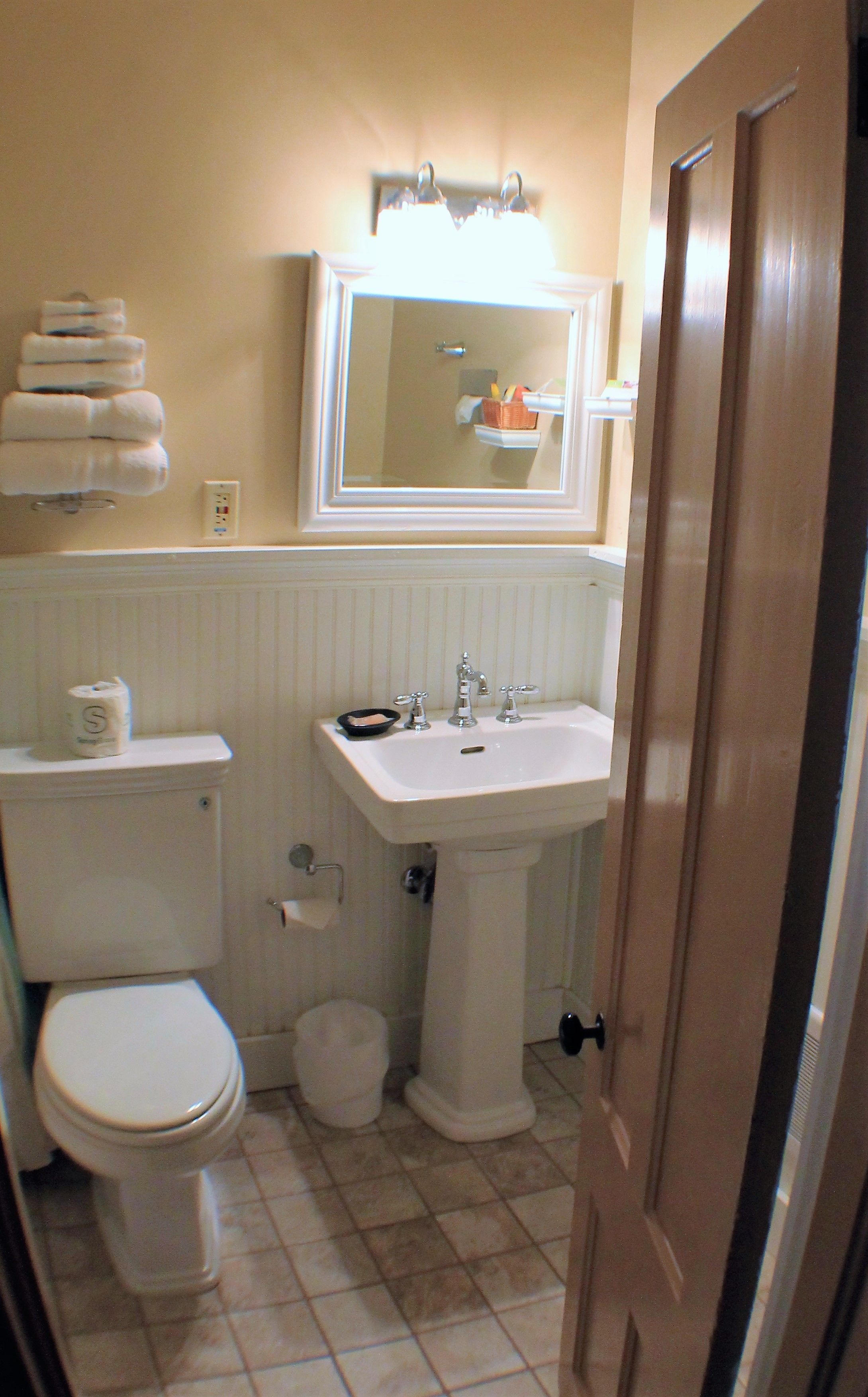 queen room | bathroom | designer toiletries, hair dryer, towels