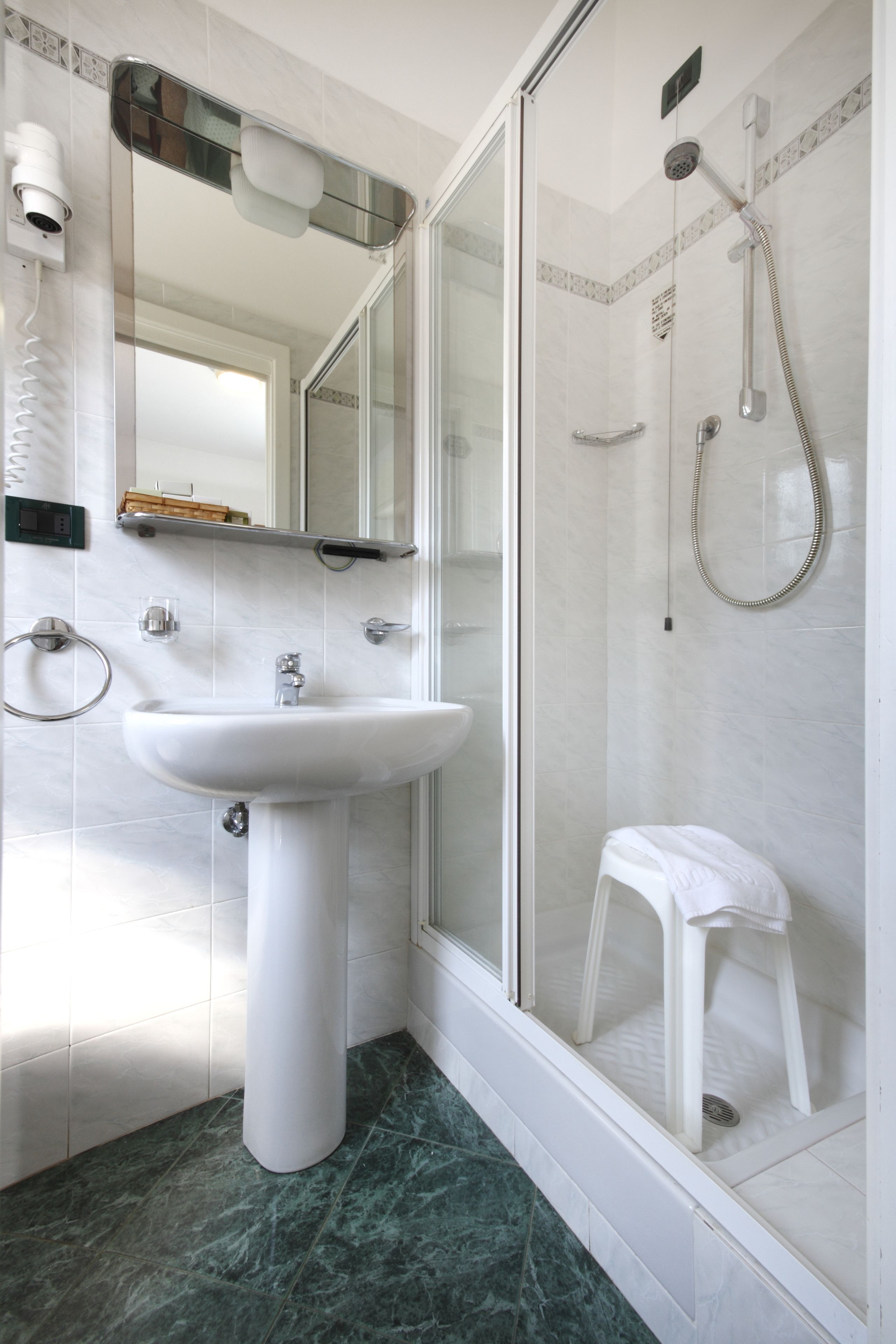 free toiletries, hair dryer, bidet, towels