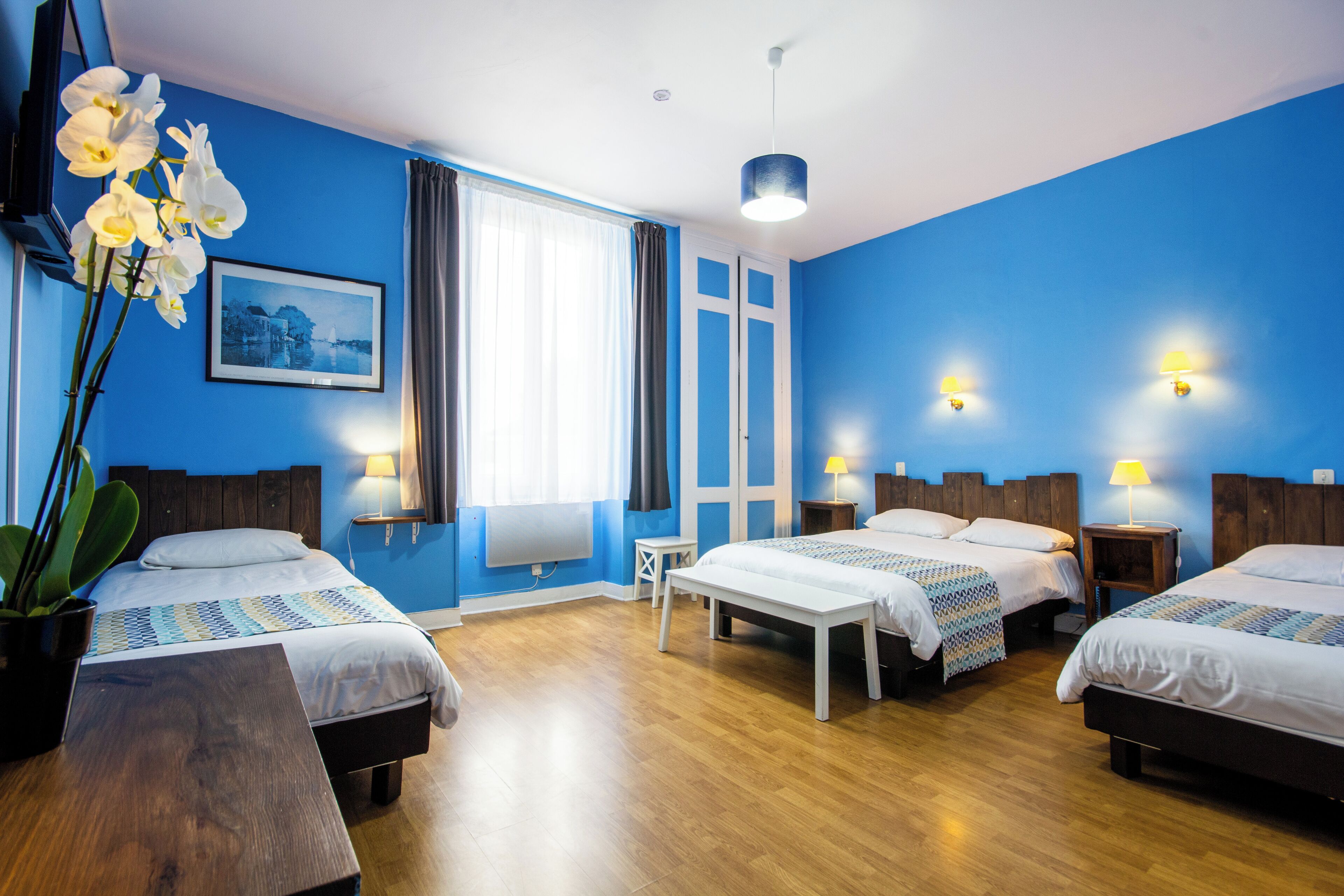 Standard Quadruple Room | Premium bedding, individually decorated, individually furnished, desk