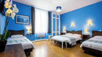 Standard Quadruple Room | Premium bedding, individually decorated, individually furnished, desk