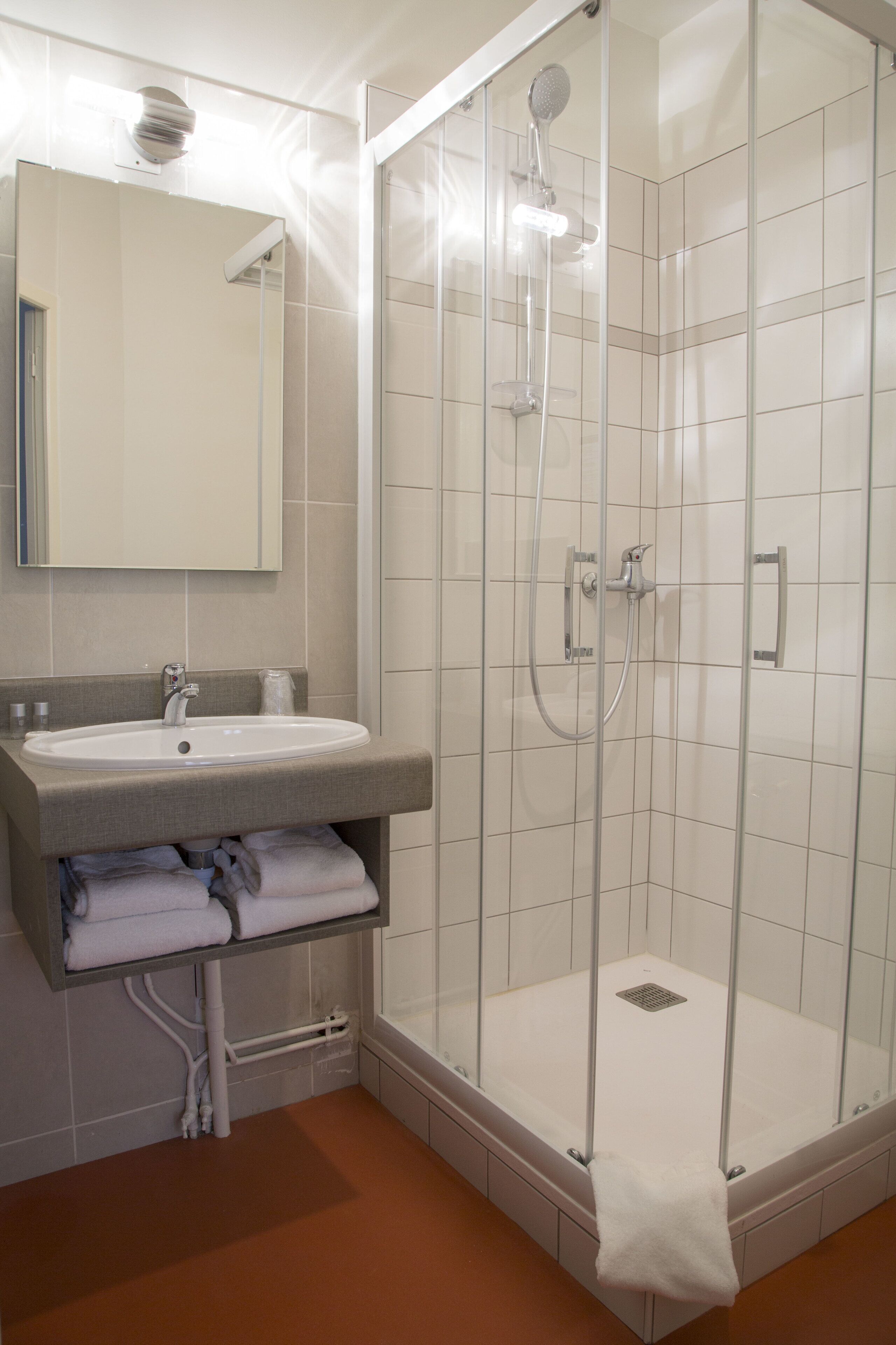 shower, free toiletries, hair dryer, towels