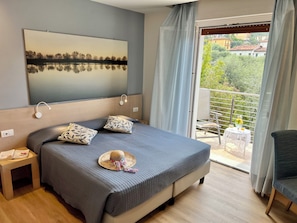 Habitación doble superior, balcón | Sábanas italianas Frette, colchones Select Comfort, caja fuerte