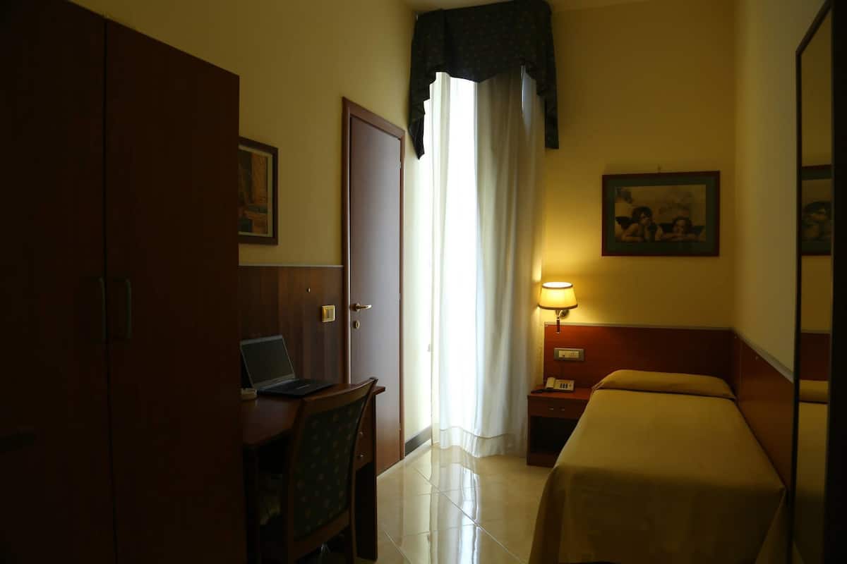 Premium bedding, down duvets, memory-foam beds, in-room safe