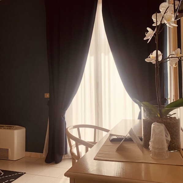 Deluxe Triple Room, Private Bathroom, Poolside | Down comforters, minibar, in-room safe, desk