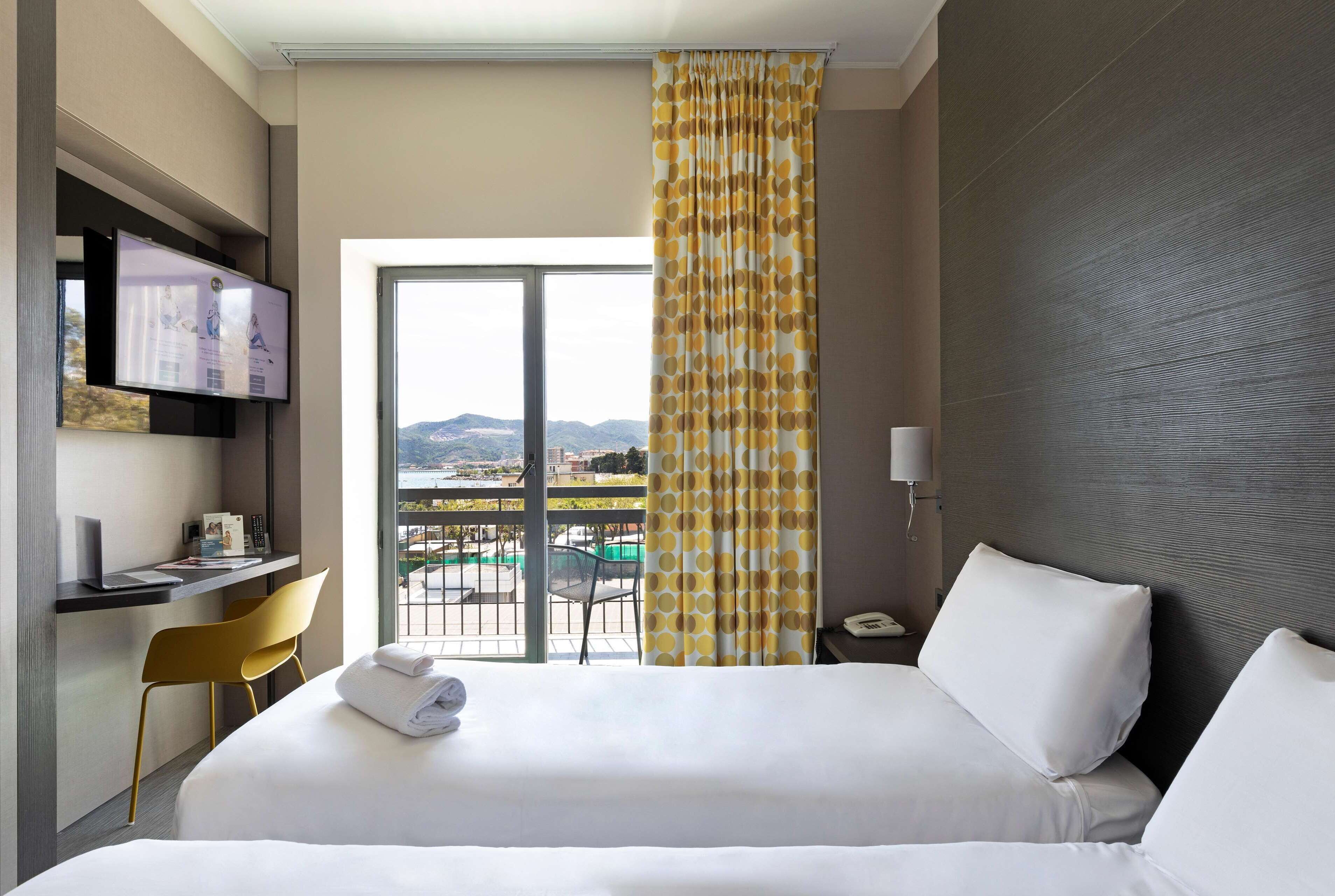 twin room, terrace | 1 bedroom, in-room safe, desk, iron/ironing board