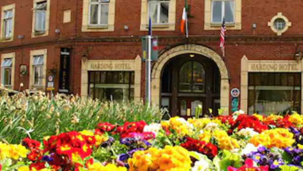 A brick building with multiple windows and a central entrance. - Harding Hotel (Dublin)