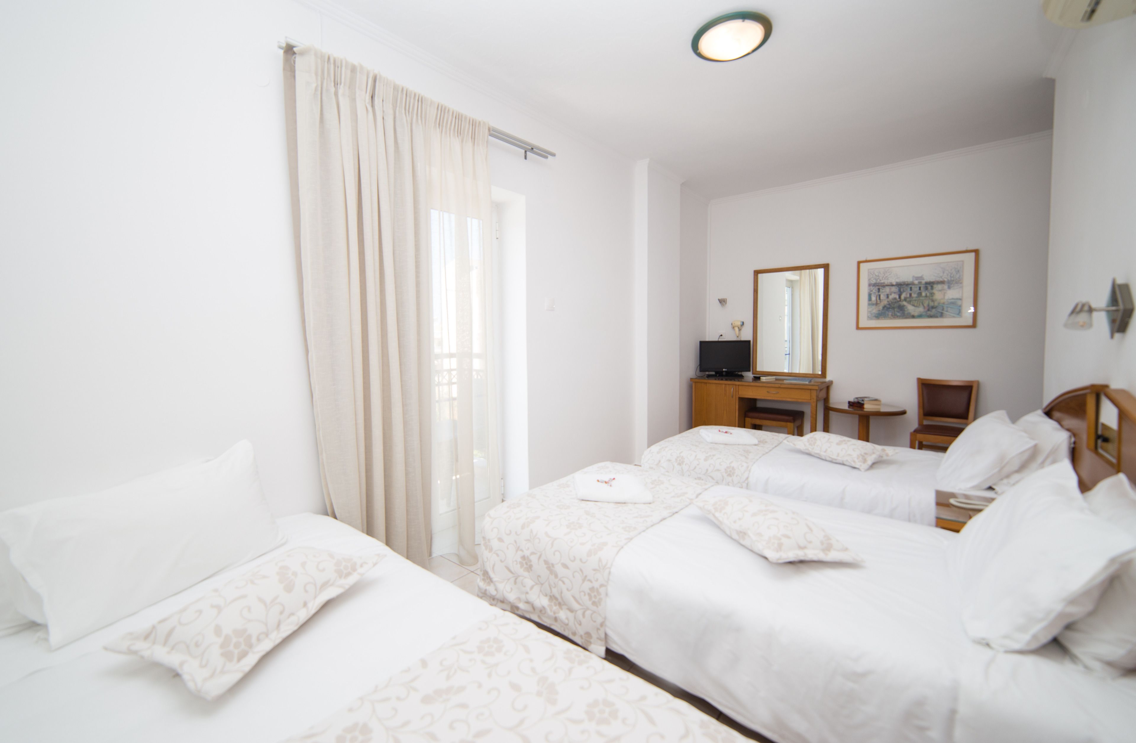 standard triple room | premium bedding, desk, iron/ironing board, free wifi
