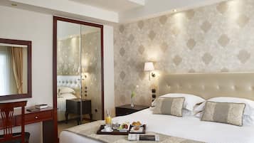 Minibar, in-room safe, individually decorated, desk