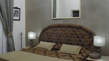 Pillow-top beds, desk, iron/ironing board, rollaway beds