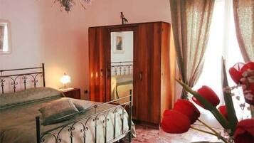 Quadruple Room, Balcony, Garden View | Frette Italian sheets, down comforters, pillowtop beds, free minibar