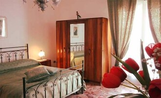 Quadruple Room, Balcony, Garden View | Frette Italian sheets, down comforters, pillowtop beds, free minibar