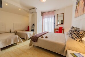 Deluxe Quadruple Room | Minibar, in-room safe, desk, iron/ironing board - Hotel Paistos (Capaccio-Paestum)