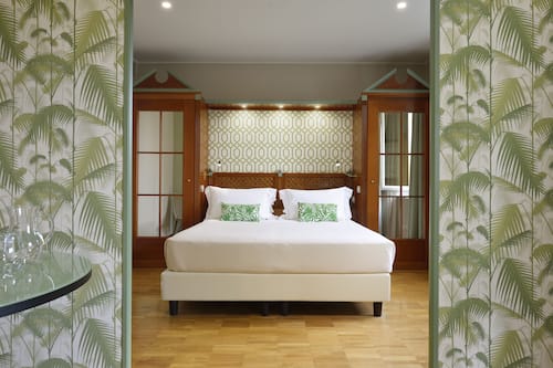 Premium bedding, down duvets, memory-foam beds, minibar