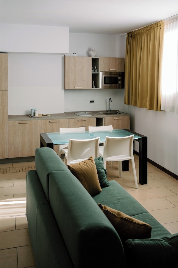 Apartment, 1 Bedroom (3 people) | Living area | LCD TV