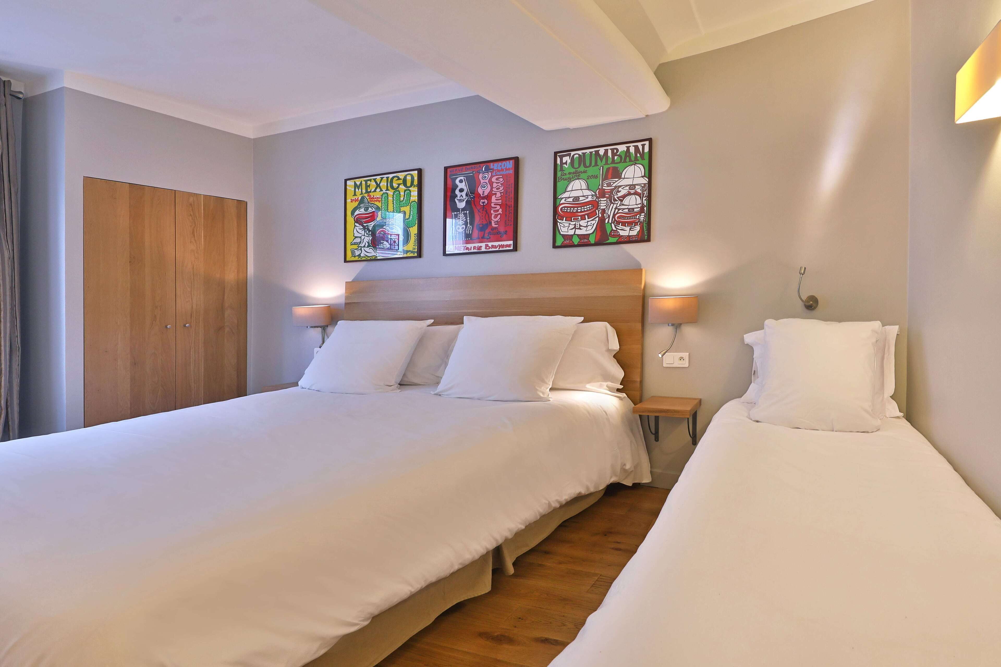 comfort triple room | premium bedding, in-room safe, desk, laptop workspace