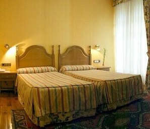 Premium bedding, down duvets, in-room safe, desk