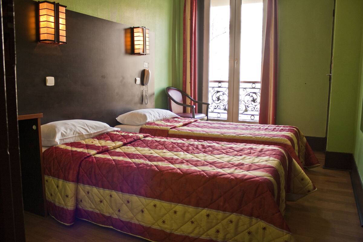 Standaard Twin kamer, 2 eenpersoonsbedden | Individueel gedecoreerd, individueel gemeubileerd, gratis wifi